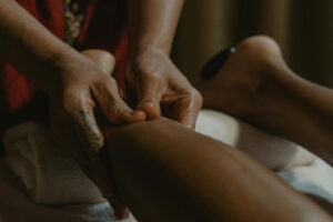 a man being a model on deep tissue massage course