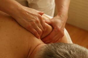 a man having a massage at sports massage course uk